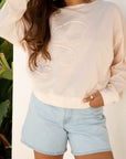 Floral Patch Raw Edge Drop Shoulder Top