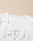 Bow Puff Sleeve Peplum Top