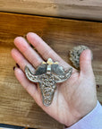 Big Antler longhorn with turquoise pendant with color flowers