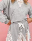 Lace Patchwork Pullover and Drawstring Skort Set