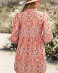 Aisha Long Sleeve Tied Neckline Mini Dress