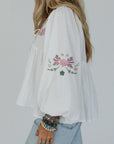 Floral Tied V-Neck Babydoll Blouse