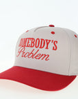 Somebody's Problem Snapback Hat