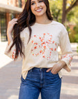 Flower Exposed Seam Wide Sleeve Top