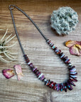 22 Inch graduated necklace more purple spiny, turquoise and sterling silver pearls