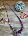 22 Inch graduated deep purple spiny and sterling silver pearls