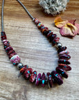22 Inch graduated necklace more purple spiny, turquoise and sterling silver pearls