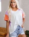 Rosalee V Neck Exposed Seam High Low Top