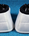 White Classic Equine No Horse No Turn Bell Boots Pair