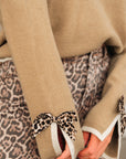 Leopard Bow Split Cuff Contrast Trim Sweater