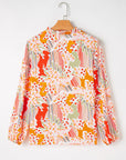Abstract Puff Sleeve V-Neck Blouse
