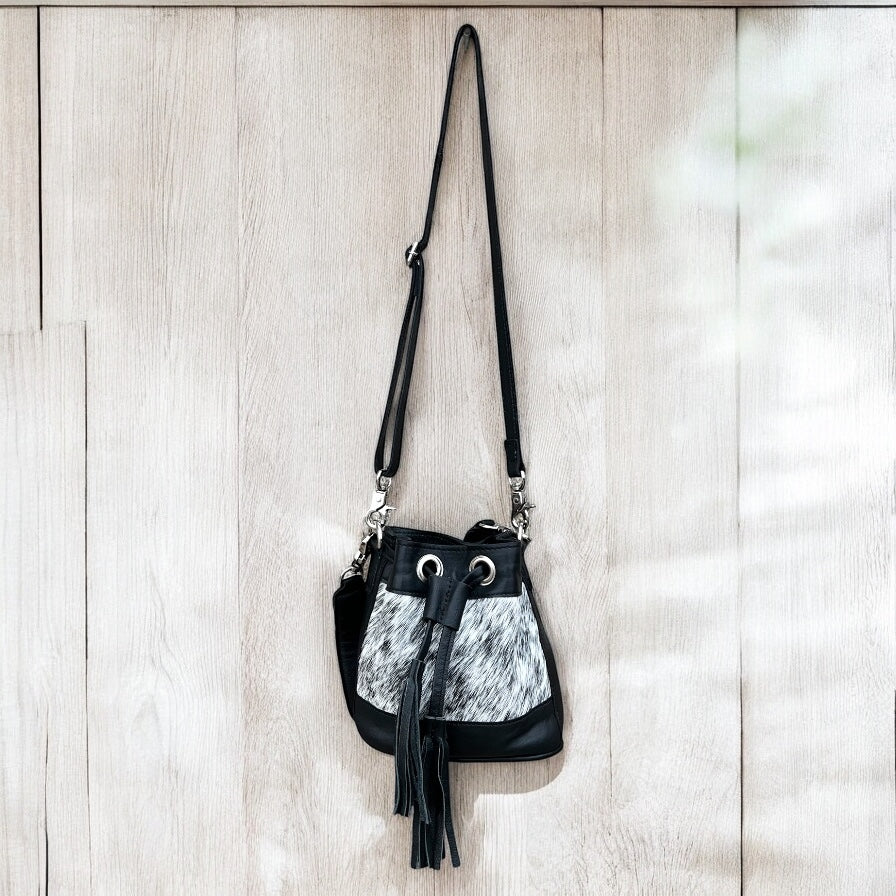 Black cowhide drawstring crossbody kids-bag