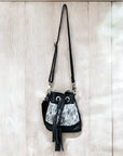 Black cowhide drawstring crossbody kids-bag