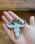 Big Antler longhorn with turquoise pendant with color flowers