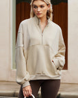 Solid Half-Zip Reverse Seam Pocketed Sweatshirt