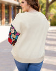 Plus Size Floral Patchwork Sleeve Textured Top