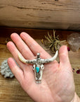 Antler longhorn with turquoise pendant