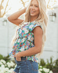 Indigo Floral Bow Applique Slit Sleeveless Peplum Blouse