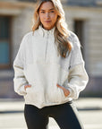 Solid Half-Zip Reverse Seam Pocketed Sweatshirt