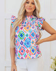 Reign Flutter Sleeve Mock Neck Shirred Blouse