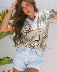 Delilah Zebra Stripe V-Neck Short Sleeve Blouse