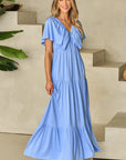Kelsey Textured Flutter Sleeve Ruffled Maxi Dress