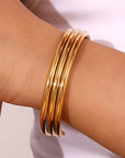 Gold Three Layered Notched Design Bangle