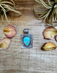 Golden Hill Turquoise Pendant – Navajo Handmade by Ned Nez, Sterling Silver