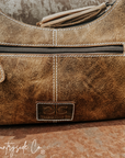 Rodeo Royalty Cowhide Purse by Countryside Co.