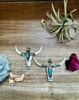 Antler longhorn with turquoise pendant