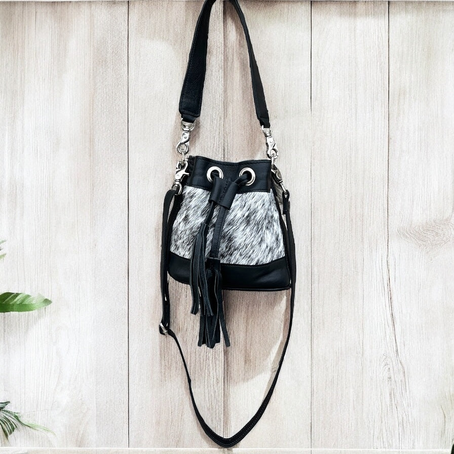 Black cowhide drawstring crossbody kids-bag