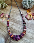 22 Inch graduated deep purple spiny and sterling silver pearls