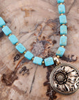 Flourished Golden Bronze Pendant Blue Turquoise Magnesite Necklace