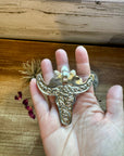 Big Antler longhorn with turquoise pendant with flowers