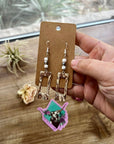 White magensite and terahertz stone dangle earrings