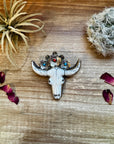 Big Antler longhorn with turquoise pendant with color flowers
