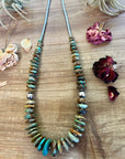 22 inch graduated turquoise necklace with Sterling silver pearls