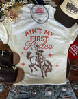 Ain't My First Rodeo Cowgirl Graphic Tee