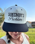 Somebody's Problem Snapback Hat