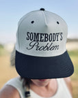 Somebody's Problem Snapback Hat