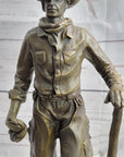 Cowboy in Chaps Holding Shovel Bronze Statue Sculpture Figure Country Western 12" x 5"