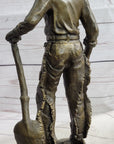 Cowboy in Chaps Holding Shovel Bronze Statue Sculpture Figure Country Western 12" x 5"