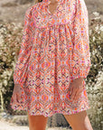 Aisha Long Sleeve Tied Neckline Mini Dress
