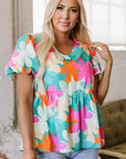 Rayne Floral V Neck Peplum Blouse