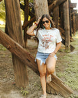 Ain't My First Rodeo Cowgirl Graphic Tee