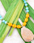 Apricot Fossil Blue Magnesite Golden Pendant Necklace