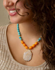 Apricot Fossil Blue Magnesite Golden Pendant Necklace