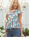 Indigo Floral Bow Applique Slit Sleeveless Peplum Blouse