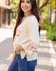 Flower Exposed Seam Wide Sleeve Top