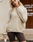 Solid Half-Zip Reverse Seam Pocketed Sweatshirt